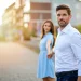 Confident man reconnecting with his partner in a long-term relationship, symbolizing attraction and masculinity