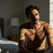 Man recovering from performance anxiety in bedroom